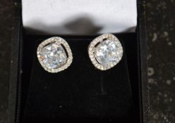 A pair of white metal silver 925 and cz stud earrings
