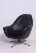 An Arne Jacobsen inspired retro 1960's black vinyl upholstered egg swivel chair - armchair.
