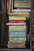 A good collection of vintage childrens books in leather suitcase to include ladybird books,
