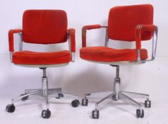 An excellent pair of chrome 1970's swivel chairs in the manner of Herman Miller bearing patent
