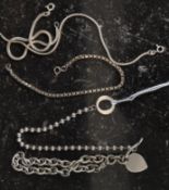 A collection of 5 silver bracelets to include chain linked with heart pendant,