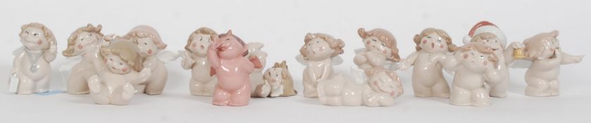 A collection Of Nao by Lladro cherub figurines to include Roly Poly, Shush Cherub, Giggles Cherub,