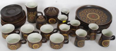 A vintage retro 1960's Denby floral pattern dinner service comprising cups, saucers,