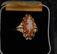 A yellow metal 10k marked gold ladies cameo ring.