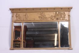 A large Victorian 19th century gilt painted overmantel triptych wall mirror.