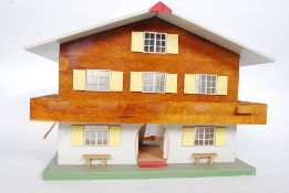 A 20th century vintage swiss style chalet dolls house