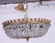 An Empire style gilt and glass droplet hanging ceiling chandelier,