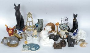 A collection of assorted ceramic cats and other cat figurines, approx 20 in total.