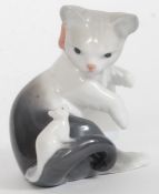 A Lladro figurine ' Cat & Mouse ' impressed factory marks to base, blue stamp to base.