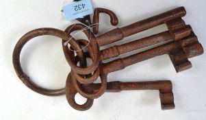A set of reproduction antique style cast iron door keys