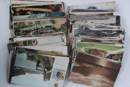 A collection of assorted postcards,
