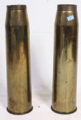 An unusually large pair of 1960's dated trench art style artillery shells in the form of umbrella