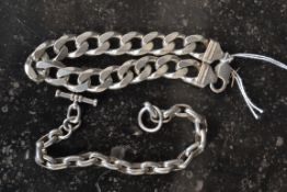 A silver heavy gentlemans curb linked bracelet together with another kerb link bracelet.