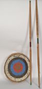 A vintage Slazenger Archery set comprising straw filled target together with 2 wooden Slazenger