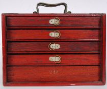 An early 20th century bone and bamboo mah jong set  with 144 bricks and extensive gambling pieces.