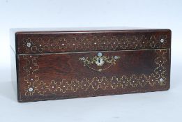 A 19th century mother of pearl and brass inlaid ladies jewellery box.