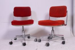 An excellent pair of chrome 1970's swivel chairs in the manner of Herman Miller bearing patent