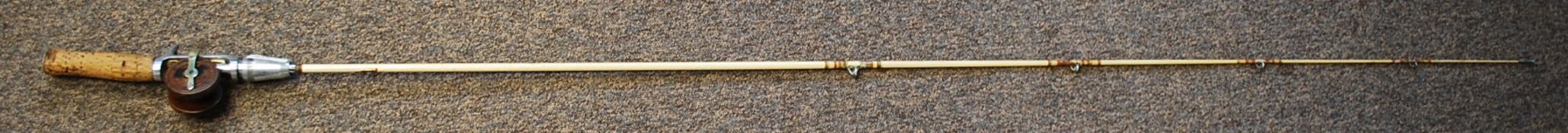 A travel one piece Fly / Trout fishing rod being stamped Bristol Pacifier,