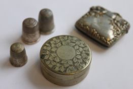 3 silver hallmarked thimbles together with a white metal vesta and a white metal pill box