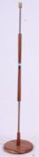 A retro / vintage teak and brass standard lamp.