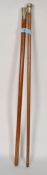 Two silver metal topped Swagger Sticks one of which is embossed with the Royal Army Medical Corp
