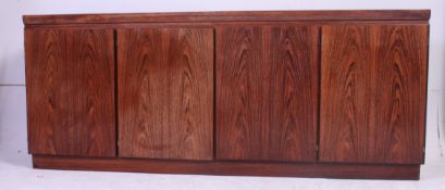 A vintage Danish Rosewood sideboard by Skovby with central double cupboard having a right hand