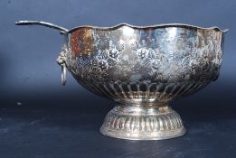 A good 20th century large silver plated heavily decorated punch bowl,