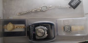 A collection of wristwatches to include three ladies and one gents watch.