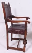 A pair of 1940's Jacobean revival oak carver armchairs.