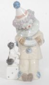 A Lladro figurine ' Pierrot with Concertin ' Model No 5279 impressed factory marks to base,