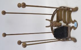 A cast metal and wood construction Horse themed shot holder / boot scraper