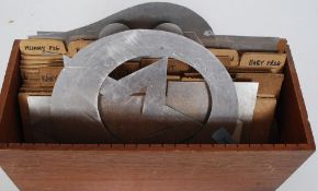 A collection of vintage stencils cut out of sheet aluminum to include Baby Rabbit, Mummy Frog,