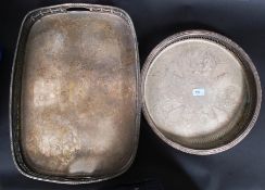 A large silver plated butlers tray, along with a similar round tray.