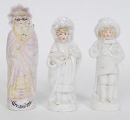 A collection of 19th century German figurines one entitled Grandma along with 2 others.