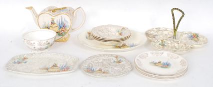 A collection of Staffordshire crinoline lady china to also include a teapot along with other items