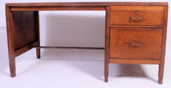 A large vintage 1930's oak twin pedestal desk  with orange original writing surface having pedestal
