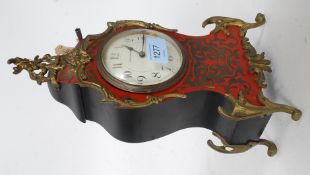 A Bravington Boulle work mantel clock having gilt brass ormulu mounts with French movement set