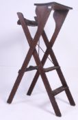 A vintage mid 20th century Tennis Umpires chair having folding action with upholstered padded top