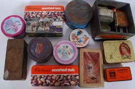 A collection of vintage advertising tins to include many different varieties to include Jacobs,