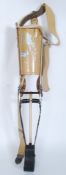 A vintage mid 20th century medical Prosthetic leg complete with foot block