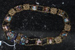 A vintage enamel set Egyptian style belt buckle, with decorative panels.