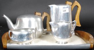 A retro / vintage Piquet Ware tea and coffee service consisting of pots, cremer,