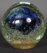 A LARGE oversized glass paperweight of dump form. 20cm tall.