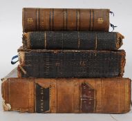 A collection of 4 antique bibles being leather bound to include examples from 1860, 1857,