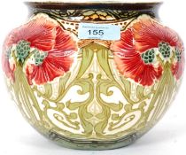 A 1920's Mintons vase. Painted with red and green florals, with Mintons stamp to base.
