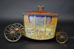 A vintage early 20th century  Jacobs biscuit tin in the form of a Royal Carriage complete with