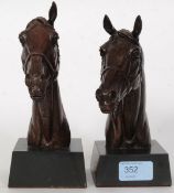 Lindley, Doris; A pair of 20th century bronze effect bust statues of a horse, signed to the rear.
