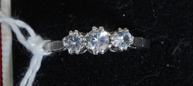 A 9ct gold and silver (marked as such) white and yellow metal three stone ladies ring