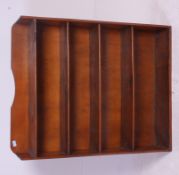 A 20th century contemporary pine open window bookcase raised on plinth base with central shelves