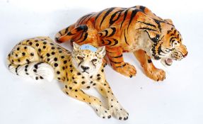 Two 20th century ceramic figures of tigers.